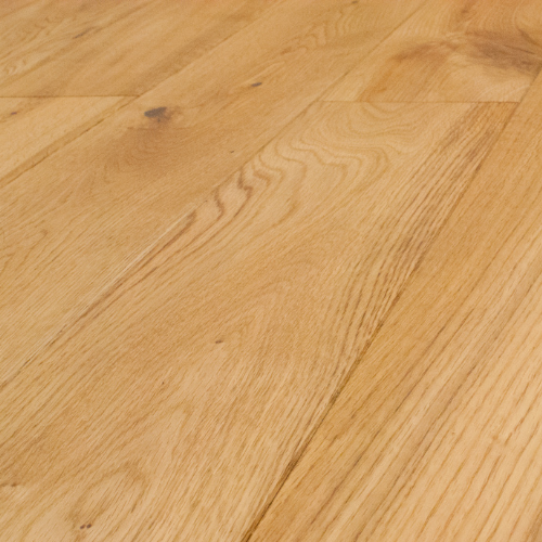 Natural oak hardwood flooring sample displaying clear wood grain and warm honey tone
