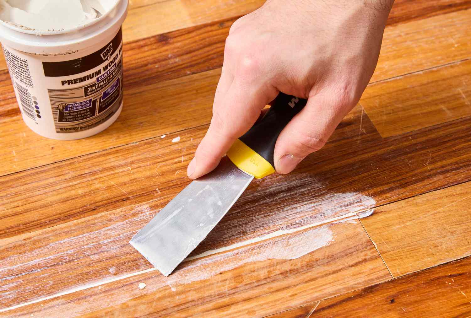 how to apply hardwood floor filler on cracks and scratches