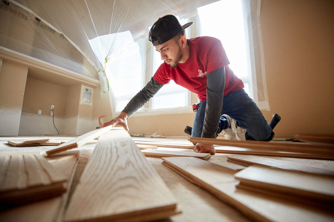 Professional hardwood floor installation - DIY vs professional cost comparison