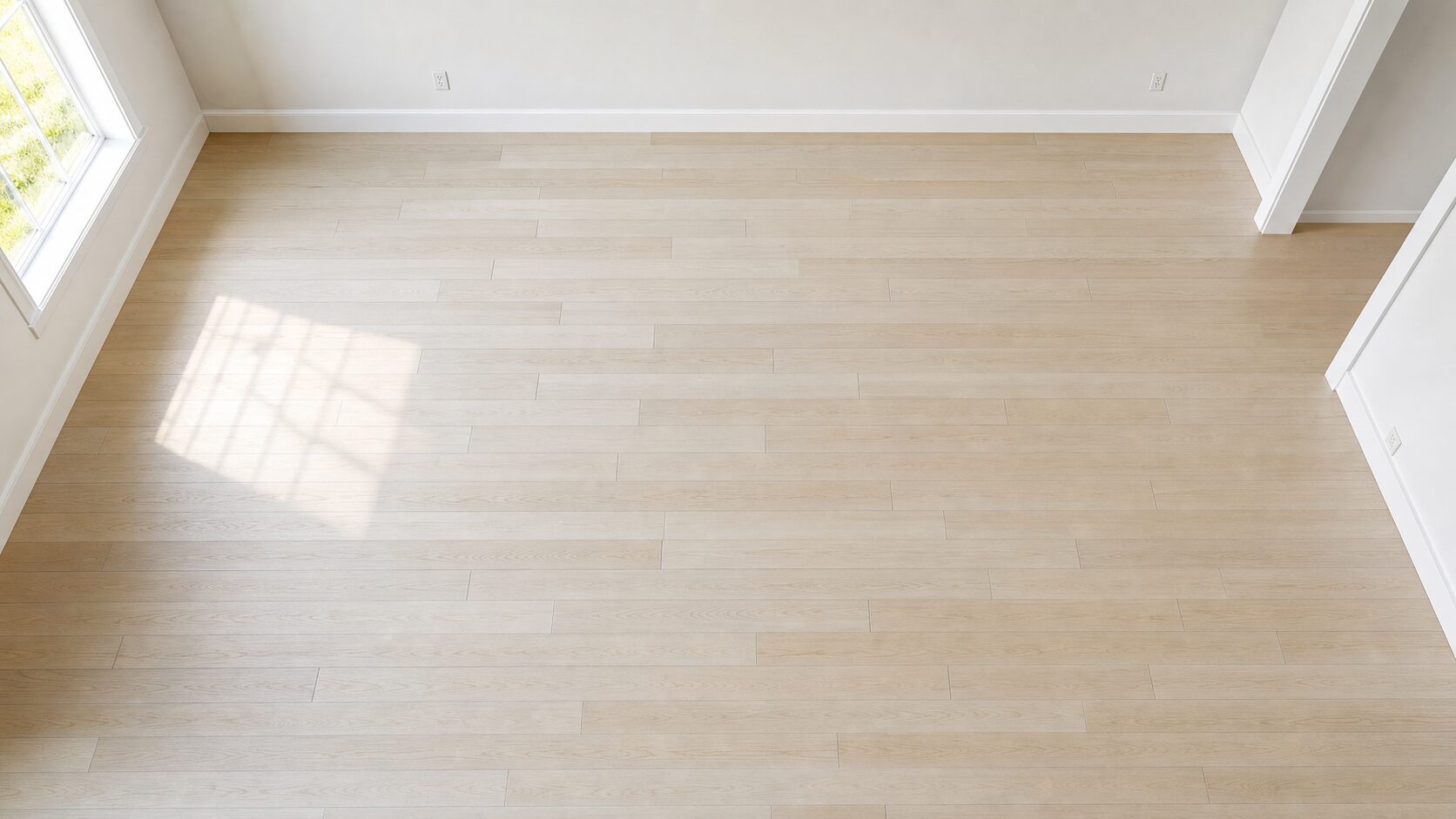 Unfinished Easiklip solid white oak hardwood flooring installed in a bright room with natural daylight