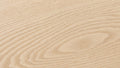 Close-up of unfinished Easiklip solid white oak hardwood showing natural grain and pale honey-tan color